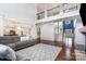 Open-concept living area with views of the kitchen and staircase at 15637 Guthrie Dr, Huntersville, NC 28078