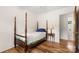 This spacious bedroom features wood floors and an entry way to another room at 1725 Fallston Rd, Shelby, NC 28150