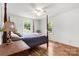 This bedroom features wood floors and a 4 post bed at 1725 Fallston Rd, Shelby, NC 28150
