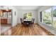 Charming dining area with hardwood floors and abundant natural light from two large lattice windows at 1725 Fallston Rd, Shelby, NC 28150