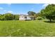 Spacious front yard with a single-story home, mature trees, and lush green grass at 1725 Fallston Rd, Shelby, NC 28150