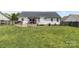 Large backyard features a deck, providing ample space for outdoor activities and relaxation at 1759 Nw Pipers Ridge Cir, Conover, NC 28613