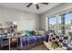 Cozy bedroom features a twin bed, a window and a desk area at 1759 Nw Pipers Ridge Cir, Conover, NC 28613