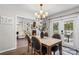 The dining room is situated between the living room and screened-in porch offering additional space at 1759 Nw Pipers Ridge Cir, Conover, NC 28613