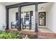 Inviting front porch with cozy seating and stylish decor at 1759 Nw Pipers Ridge Cir, Conover, NC 28613