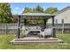 Backyard gazebo with comfortable seating, perfect for outdoor lounging and entertaining at 1759 Nw Pipers Ridge Cir, Conover, NC 28613