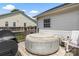 Backyard deck features a Coleman hot tub with seating area, perfect for relaxation at 1759 Nw Pipers Ridge Cir, Conover, NC 28613