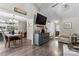 Inviting living room boasts wood floors, decor, and modern touches, creating a cozy and stylish atmosphere at 1759 Nw Pipers Ridge Cir, Conover, NC 28613