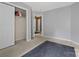 Neutral bedroom featuring a closet and open doorway to the rest of the house at 181 Mott Rd, Mooresville, NC 28115