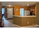 Inviting kitchen featuring wooden cabinets, and a breakfast bar overlooking the dining area at 181 Mott Rd, Mooresville, NC 28115