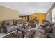 Spacious living room with warm tones leads into a dining area at 181 Mott Rd, Mooresville, NC 28115