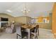 Open floorplan featuring fireplace, dining area and a view to the entryway at 181 Mott Rd, Mooresville, NC 28115