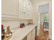 Stylish bar area with glass shelving, counter space, and wine storage at 2129 Halford Pl, Charlotte, NC 28211