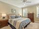 Comfortable bedroom featuring neutral decor, natural light, and wood furniture at 2129 Halford Pl, Charlotte, NC 28211