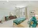 Bright bedroom with neutral tones, sitting area, and dresser at 2129 Halford Pl, Charlotte, NC 28211