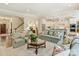 Open-concept living room with a staircase and access to the kitchen at 2129 Halford Pl, Charlotte, NC 28211