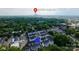 Aerial view of townhome community with uptown Charlotte skyline in the background at 2254 Electric Ln, Charlotte, NC 28205