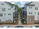 Aerial view of the townhomes showcasing their layout and the surrounding green spaces at 2254 Electric Ln, Charlotte, NC 28205