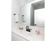 Modern bathroom with quartz countertop vanity, black faucet, and rectangular mirror at 2254 Electric Ln, Charlotte, NC 28205