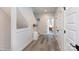 Bright hallway with hardwood floors leading to the bedrooms at 2254 Electric Ln, Charlotte, NC 28205