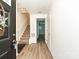 Welcoming foyer with durable wood-look flooring and easy access to the staircase at 2715 Sydney Overlook Ln, Charlotte, NC 28269