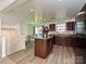 Charming kitchen seamlessly connects to the dining area with lots of natural light at 2715 Sydney Overlook Ln, Charlotte, NC 28269