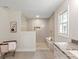 Spacious bathroom with walk-in shower with seating and granite countertop at 300 Hugh Crocker Rd, Matthews, NC 28104
