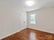 Simple bedroom with closet space and a view to the outdoors at 300 Hugh Crocker Rd, Matthews, NC 28104