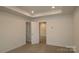 Bright bedroom with neutral walls, plush carpet, and recessed lighting showcases comfort and style at 3156 Lilac Grove Dr, Charlotte, NC 28269