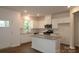 Bright, white kitchen featuring stainless steel appliances and granite countertops at 3156 Lilac Grove Dr, Charlotte, NC 28269