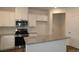 Bright, white kitchen featuring stainless steel appliances and granite countertops at 3156 Lilac Grove Dr, Charlotte, NC 28269