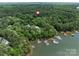 Stunning aerial view showcasing proximity to the lake and community boat docks at 3825 Mountain Cove Dr, Charlotte, NC 28216