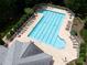 Aerial view of a large pool with lounge chairs at 3825 Mountain Cove Dr, Charlotte, NC 28216