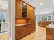 Spacious kitchen featuring wooden cabinets, granite countertops and access to the dining room at 3825 Mountain Cove Dr, Charlotte, NC 28216