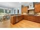 Modern kitchen with granite countertops, stainless steel appliances, and wooden cabinets at 3825 Mountain Cove Dr, Charlotte, NC 28216