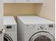 Laundry room featuring side-by-side washer and dryer units with bright lighting at 3825 Mountain Cove Dr, Charlotte, NC 28216