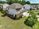 Aerial shot of a two-story home with a well-manicured lawn and a two-car garage at 4321 Tucker Chase Dr, Midland, NC 28107