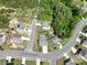 Neighborhood aerial view of homes with manicured lawns, mature trees, and cul-de-sac streets at 4321 Tucker Chase Dr, Midland, NC 28107
