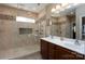 Modern bathroom featuring a glass shower, tile accents, and double vanity sinks at 4321 Tucker Chase Dr, Midland, NC 28107