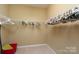 Walk-in closet with wire shelving, hanging clothes and empty space to organize personal items at 4321 Tucker Chase Dr, Midland, NC 28107