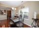 Bright dining area with stylish table set and natural light from the window at 4321 Tucker Chase Dr, Midland, NC 28107