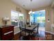 Comfortable dining room with adjacent sunroom for extra living space at 4321 Tucker Chase Dr, Midland, NC 28107
