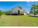 Well-maintained two-story home with brick accents, a three-car garage, and green landscaping at 4321 Tucker Chase Dr, Midland, NC 28107