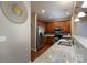 Well-equipped kitchen with granite counters, stainless steel appliances, and warm wood cabinetry at 4321 Tucker Chase Dr, Midland, NC 28107