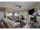 Bright and airy living room featuring a fireplace, neutral decor, and comfortable seating at 4321 Tucker Chase Dr, Midland, NC 28107