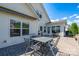 Backyard patio with a dining table and chairs that can accommodate up to four people at 4321 Tucker Chase Dr, Midland, NC 28107