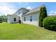 Home exterior with a well-maintained lawn and mature landscaping at 4321 Tucker Chase Dr, Midland, NC 28107