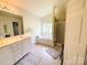 Bright bathroom featuring a soaking tub beneath a window and separate shower at 4698 Hannah Dr, Rock Hill, SC 29732