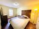 Bright bedroom with dark wood floors and decor at 4698 Hannah Dr, Rock Hill, SC 29732