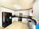 Updated kitchen featuring stainless steel appliances, white cabinets, and tile flooring at 4698 Hannah Dr, Rock Hill, SC 29732